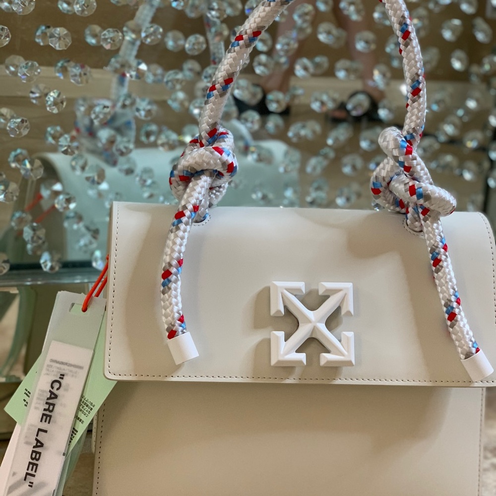 - Off white handbag semi wear